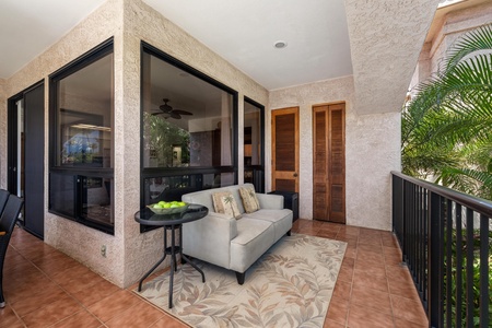 Step out onto your private terrace and settle into plush seating surrounded by tropical palms. Feel the warm breeze while you relax with morning coffee or evening conversation in this peaceful outdoor retreat.