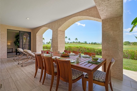 - Host meals outdoors with panoramic views of the golf course and open skies - Elegant wood dining table seats eight under a shaded arched patio - Enjoy peaceful mornings or festive evening gatherings in this breezy retreat