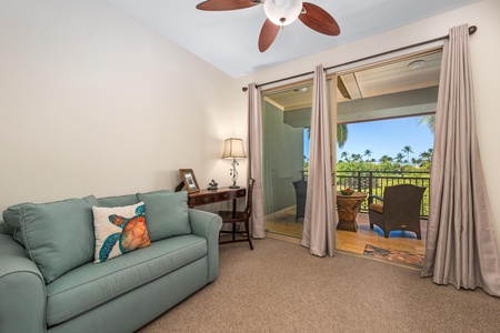 Primary suite with king bed and lounge area