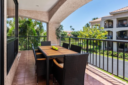 Step onto your private covered balcony and enjoy morning coffee or sunset cocktails at the outdoor dining table. Tropical breezes, lush greenery, and resort garden views create your perfect escape.
