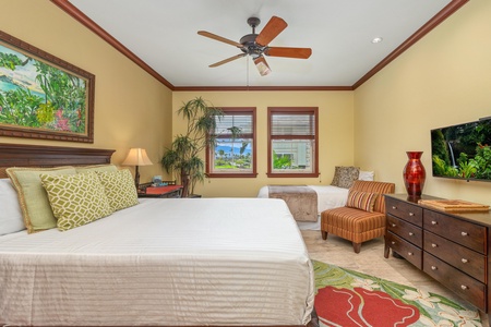 Unwind in your bright, welcoming bedroom with plush bedding, tropical décor, and peaceful garden views through the windows—your own island retreat awaits.