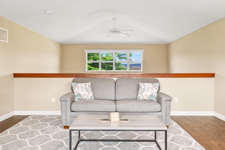 Loft with two twin bunk beds seating area