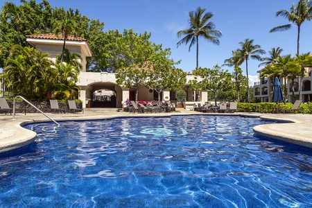 Pool grounds with bbq's and seating.