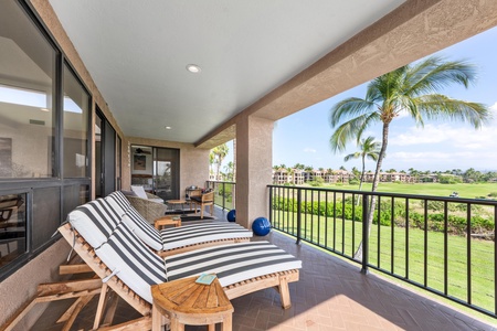 Unwind on your private balcony with striped loungers.