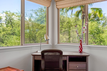 Guest bedroom with twin beds and work space