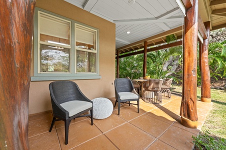 Relax in your private covered patio with comfortable seating overlooking lush tropical gardens and swaying palms.