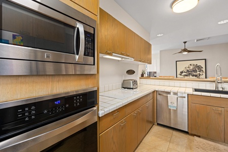 Your fully equipped kitchen with stainless steel appliances, and ample counter and storage space.