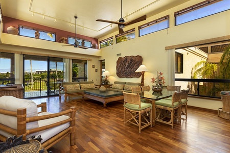 Spacious living and dining area with high ceilings and natural light.