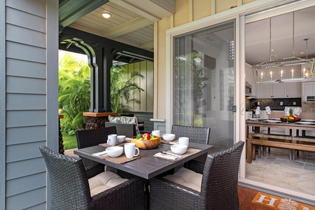 Covered lanai with tropical landscaping