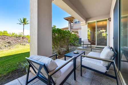 Step onto your private covered patio, where plush seating invites you to unwind with morning coffee or evening cocktails. The lush garden and gentle island breeze create your perfect outdoor sanctuary.