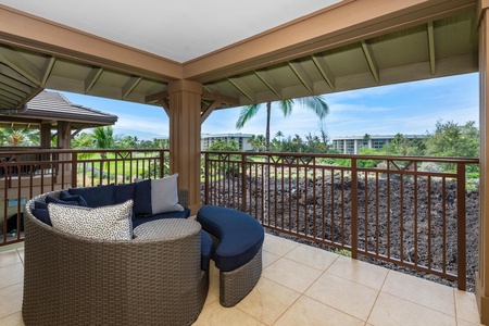 Your private balcony beckons with plush seating where you'll savor morning coffee while overlooking tropical gardens and distant mountains.