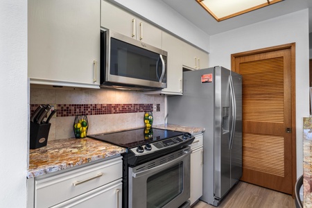 Your fully equipped kitchen features granite countertops, stainless appliances, and everything you need to prepare delicious meals during your stay.