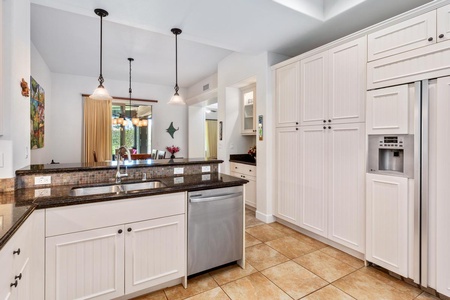 - Clean and bright kitchen with full size dishwasher and large pantry - Tall cabinets offer generous storage for long or short stays alike - Great visibility and flow to dining and living areas through open layout