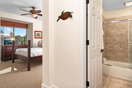 Hallway view leading from guest bedroom to bathroom