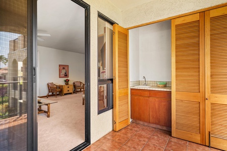 Your private terrace features a convenient wet bar and stylish louvered storage, perfect for outdoor entertaining.