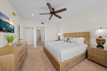 Drift into peaceful sleep in your serene master bedroom, where crisp linens and ocean-inspired decor create your perfect coastal retreat.