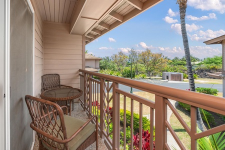 Enjoy peaceful mornings or sunset drinks from this private covered balcony.