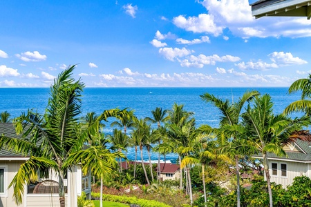 Stunning ocean view framed by beautiful  tropical palm trees.