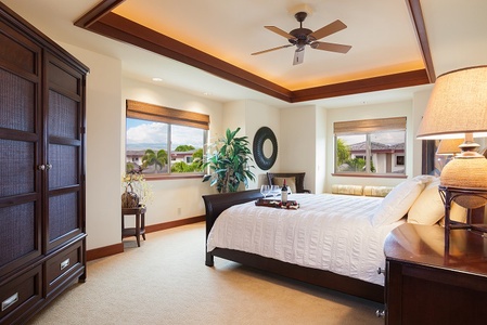 - Bright bedroom with king bed and multiple windows for natural light   - Elegant wood accents and soft lighting enhance the cozy atmosphere   - Thoughtful details like fresh flowers and tray service elevate the stay