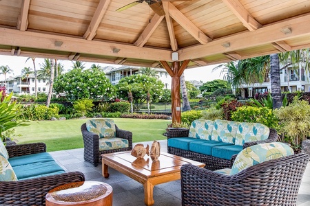 Covered outdoor seating area with garden views.