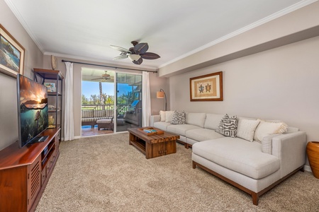 Sink into plush seating while tropical breezes flow through your sliding doors to the private balcony beyond.
