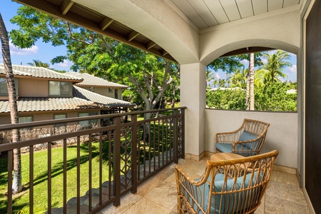 Enjoy shaded seating and beautiful views from this private upper level balcony.