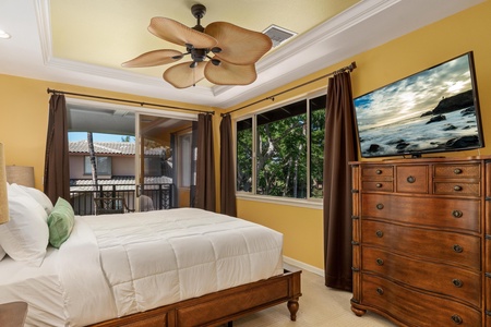 Large windows and lanai bring in tropical vibe.