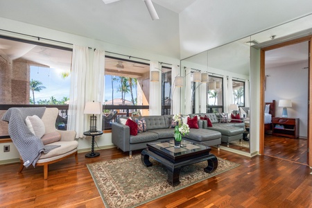 Living room with vaulted ceiling and outdoor access