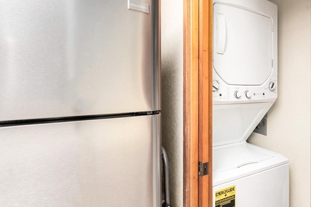 Keep your clothes fresh throughout your stay with convenient in-unit laundry facilities, perfectly tucked away for your comfort.