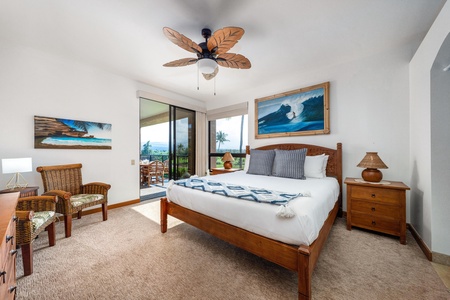 Comfortable primary bedroom with island-inspired décor, cozy furnishings, and private lanai access