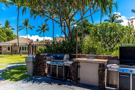 Outdoor BBQ station with counter space and tropical views.