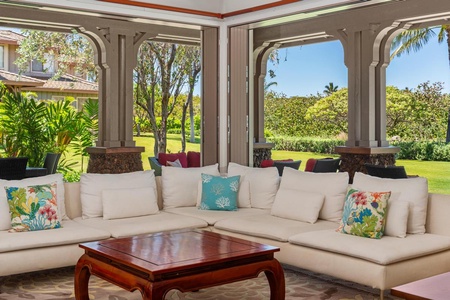 - Stylish corner seating invites you to relax while gazing at palm lined views - Thoughtful touches like accent pillows enhance the cozy tropical feel - Ideal for reading, napping, or simply soaking in the scenery
