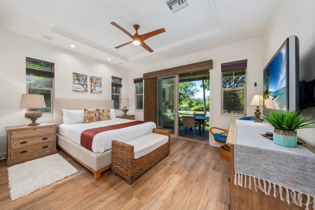 Your serene bedroom retreat features coastal-inspired furnishings and opens to a private terrace where morning coffee awaits.