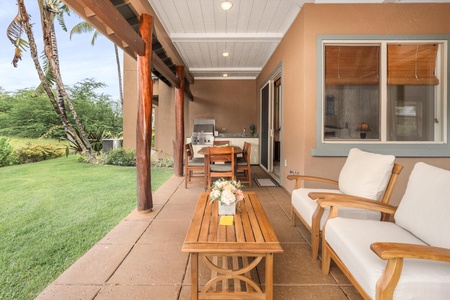Unwind on your private covered patio with comfortable seating, dining space, and lush garden views—perfect for morning coffee or sunset relaxation.