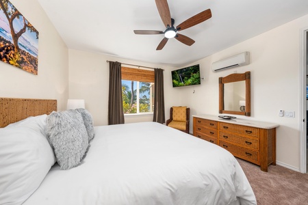 Sink into plush bedding and wake to tropical views through your window, while staying cool with air conditioning and ceiling fan comfort.