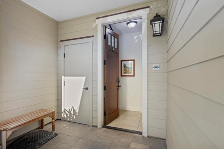 Welcoming entrance with warm wood details and thoughtful touches sets the tone for your comfortable stay.