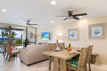- Dine in comfort while enjoying peekaboo ocean views and the open living space - Earthy textures and botanical accents blend perfectly with the coastal vibe - Just steps from the lanai, this spot is ideal for casual bites or evening feasts