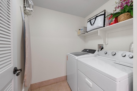 Your own private laundry room keeps your clothes fresh throughout your stay, with convenient shelving for supplies.