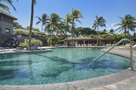 Dive into crystal-clear turquoise waters surrounded by swaying palms and tropical paradise at your doorstep.