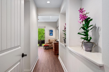 Hallway to primary bedroom