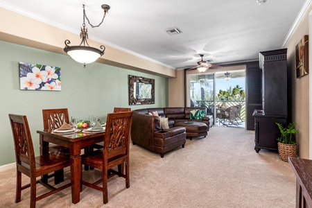 Open concept layout connects living room, dining, and kitchen