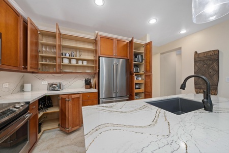 A well-equipped kitchen featuring a variety of high-quality appliances and cookware to make cooking easy and enjoyable.