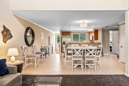 Open concept layout connects kitchen, dining, and living room