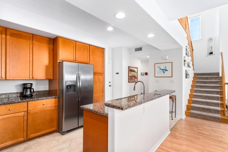 Full equipped kitchen opens to dining and living area.dining and entryways keeps flow smooth and easy