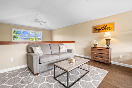 Loft with two twin bunk beds seating area