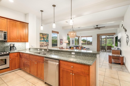 Your spacious kitchen features granite counters, stainless appliances, and an open design perfect for gathering with loved ones.