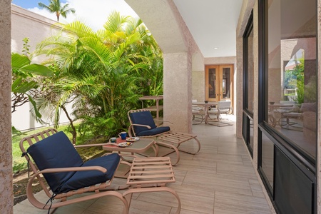 - Outdoor patio tucked beneath arches with two cushioned lounge chairs for relaxing - Surrounded by beautiful tropical foliage for a quiet escape just outside your room - Smooth tile floors and a shaded setting offer cool comfort in the heat