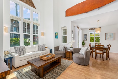 Airy living room flows effortlessly into the dining area.