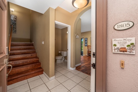 Step into your welcoming Hawaiian retreat, unit 1805. Warm wood floors guide you through an inviting entry with tropical touches that set the tone for relaxation and island living.