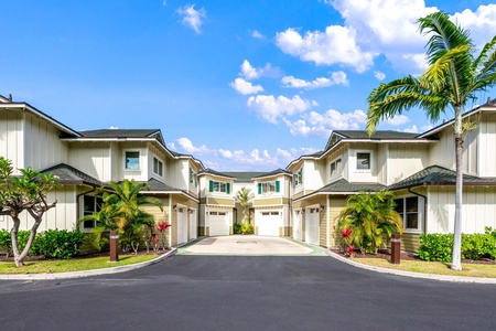 Charming townhouse complex with tropical landscaping.